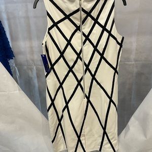 White pencil style dress with black ribbon design